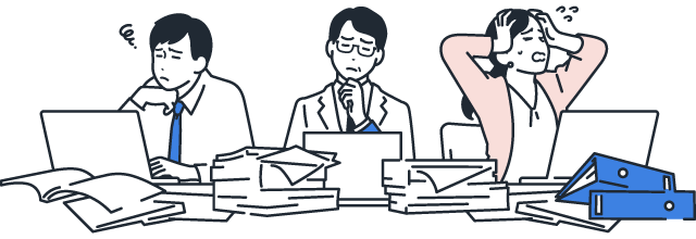 机の上に溢れている資料と困っている社員のイラスト